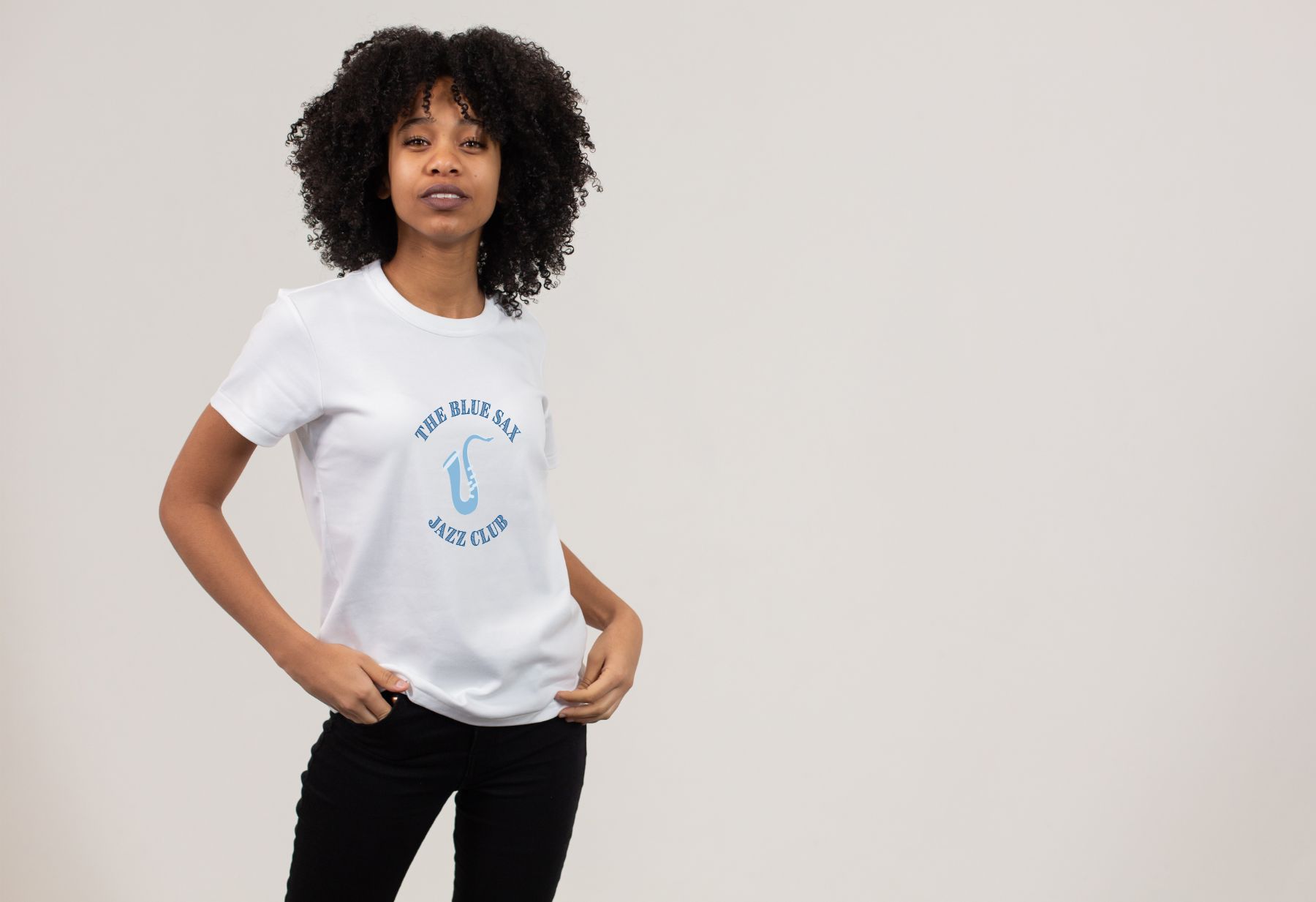 Decorated Apparel and Promotional Products for Nashville, Tennessee womain a white t-shirt printed with The Blue Sax Jazz Clun in Nashville, TN logo