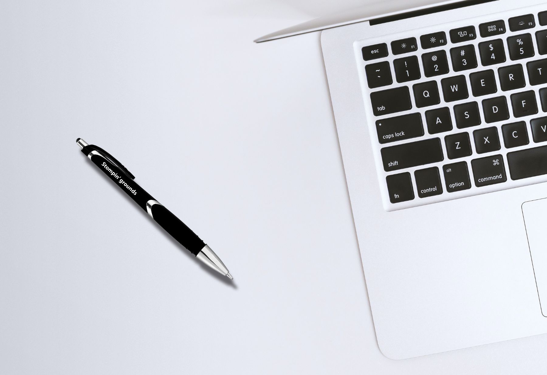 Imprinted Pens, Swag, and Promotional Products for Nashville, Tennessee customized black ballpoint pen customized with Stompin' grounds logo